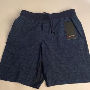 T.H.E. Short 9” Linerless - heathered navy blue new with tag